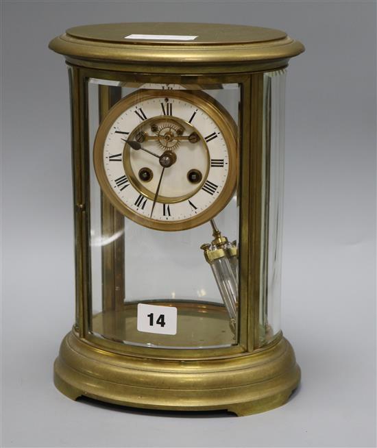 An oval four glass mantel clock height 21cm